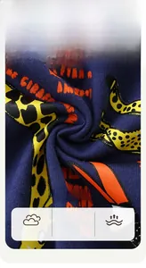Close-up of 100% cotton navy blue knitted fabric with cartoon giraffe and letter print