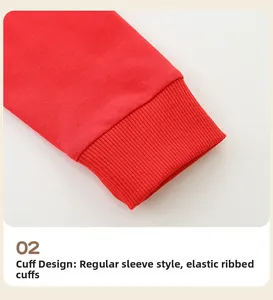 Detail of red knit sweatshirt featuring elastic ribbed cuffs and premium cotton texture