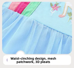 Detail of girls cotton dress featuring waist embroidery and tiered tulle mesh skirt layers