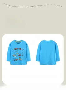 Detail view of blue cotton kids long sleeve shirt with construction vehicle prints