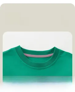 Detail of green cotton T-shirt ribbed neckline with purple inner reinforcement tape