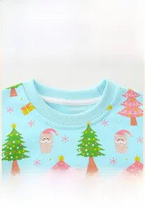 Close-up of ribbed crewneck detail on cotton kids Christmas sweatshirt with festive prints