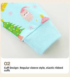 Close-up of elastic ribbed cuffs on a light blue Christmas printed cotton sweatshirt