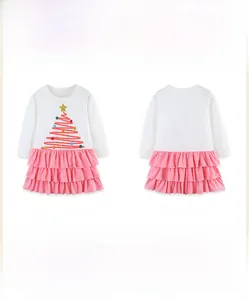 Detail view showing front and back of long-sleeved Christmas dress with tree print and pink skirt