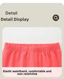 Détail de la taille élastique rose sur legging pour filles avec coutures lisses