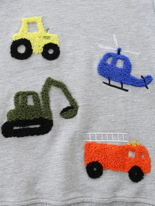 Grey boys sweatshirt featuring colorful towel-embroidered cartoon construction vehicles