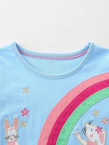 Light blue cotton girls dress featuring fine rainbow and rabbit embroidery details