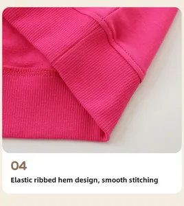 Detail of pink sweatshirt elastic ribbed hem with flat stitching and neat sewing process