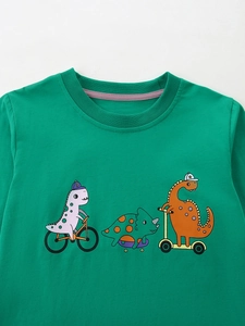Green long sleeve t-shirt for boys with three cartoon dinosaurs riding on the front