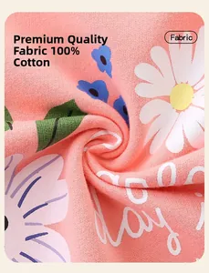 Detailed macro view of soft 100% cotton knit fabric with floral daisy print in pink