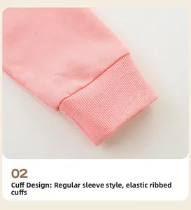 Detail of pink girls sweatshirt showing elastic ribbed cuffs and soft cotton knit fabric