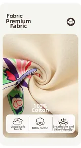 Macro detail of soft apricot 100% cotton fabric with colorful butterfly prints