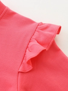 Girl's pink crewneck sweatshirt with cute ruffle sleeves and soft knit fabric detail