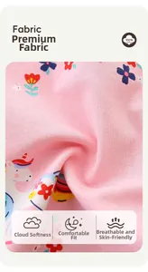 Detail of soft 100% cotton fabric with cartoon unicorn and floral print for kids pants