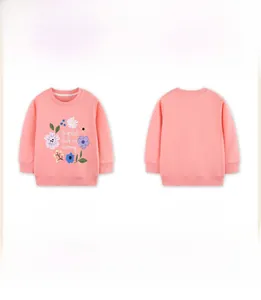 Detail of pink cotton girl sweatshirt with flower print and ribbed round neck collar