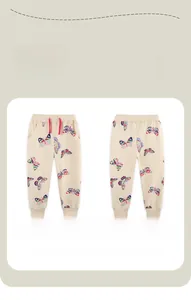 Detail of girls' jogger pants showing colorful butterfly print and drawstring waistband