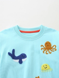 Girls light blue cotton sweatshirt featuring cute sea animal towel embroidery patches