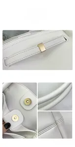 Detail of white leather tote bag featuring fine stitching and light gold magnetic buckle