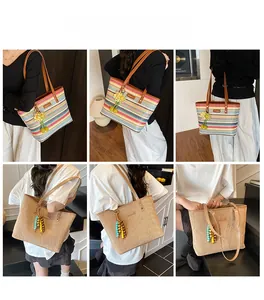 Multiple views of large rainbow striped and solid straw tote bags with leather straps