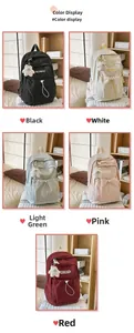 Detailed view of lightweight nylon backpacks in black, white, green, pink, and red colors