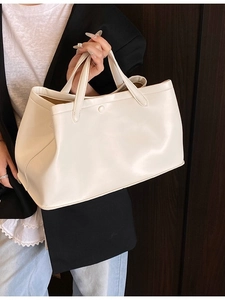 Chic minimalist off-white faux leather tote bag for women with elegant top handle style