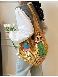 Yellow knitted tote bag with cartoon embroidery in a casual shoulder carry style