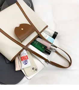 Top view of large tote bag interior showing ample storage space for various daily items