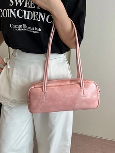 Pink minimalist faux leather shoulder bag with double straps and rectangular pillow shape