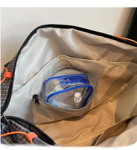 Detail view of the dry-wet separation interior with a waterproof zipper pocket