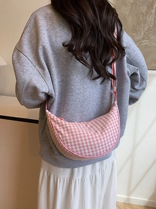 Chic pink and white checkered half-moon crossbody bag for women daily fashion style