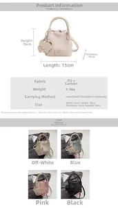 Close-up of litchi grain texture handbag showing size specs and elephant charm detail