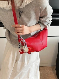 Red lychee pattern leather half-moon crossbody bag with heart and elephant charms