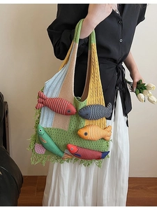 Handmade crochet tote bag with colorful patchwork, green tassels and 3D fish appliques