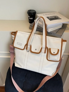 Sac cabas en toile avec bordure en cuir et bandoulière rose pour les déplacements quotidiens