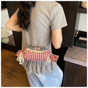 Charming candy-shaped crossbody bag with red gingham fabric and blue denim lace details