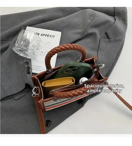 Detailed view of striped tote bag interior showing spacious capacity for daily essentials