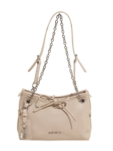 Minimalist beige underarm bag with silver chain, bow detail, and adjustable strap