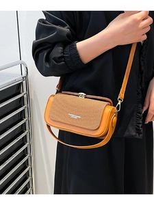 Retro contrast color crossbody bag in orange-brown leather with woven flap and gold buckle