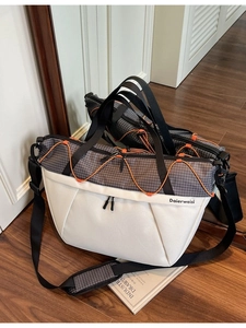 Large capacity crossbody gym travel bag with orange drawstring and checkered pattern