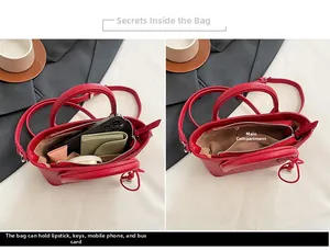 Détail du sac seau en cuir grainé rouge montrant la capacité pour les essentiels quotidiens