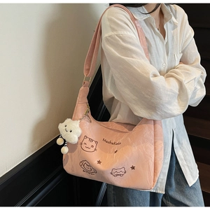 Pink pleated tote bag with cute cat prints and a white cloud plush charm detail