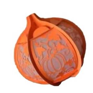 Orange pumpkin silicone mold for Halloween baking with detailed hollow carving design