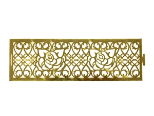 Close-up of golden laser-cut rose patterns on the metal wedding napkin rings