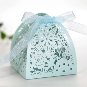 Laser-cut light blue wedding favor candy box with pearl paper and organza ribbon