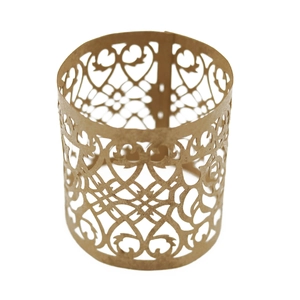 Detailed macro view of laser-cut hollow rose patterns on a kraft paper napkin ring