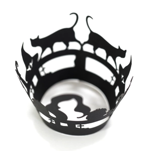 Laser cut Halloween cupcake liners featuring black cat and wizard hat silhouettes