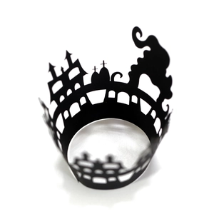 Black laser-cut Halloween cupcake wrappers with castle and ghost silhouette designs