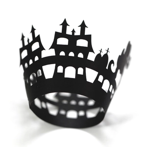 Black laser-cut Halloween cupcake wrappers featuring gothic castle silhouettes for party decor