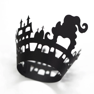 Detailed laser-cut black haunted castle and graveyard cupcake wrappers for Halloween