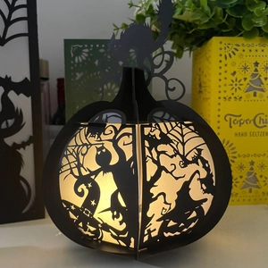 3D hollow pumpkin paper lantern with witch and owl cutouts for Halloween ambiance
